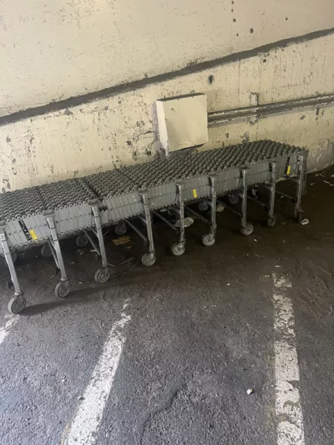 INDUSTRIAL FLEXIBLE 24"x 72"-298"L SKATE WHEEL CONVEYOR. VERY GOOD