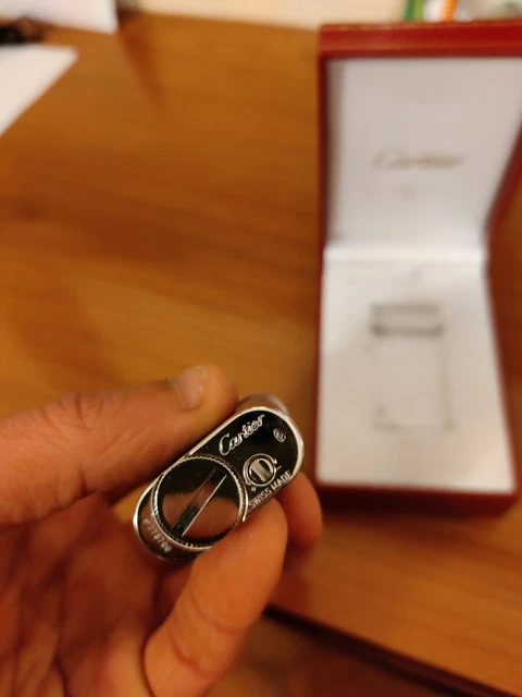 accendino cartier con rifiniture in palladio 
