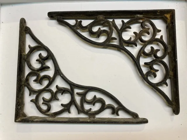 Victorian Antique cast iron shelf brackets pair