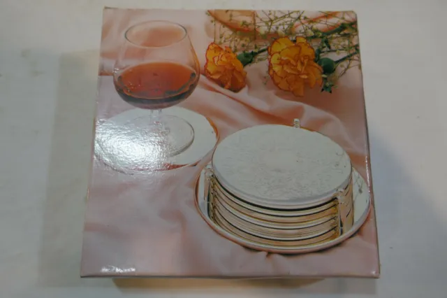 Vintage New Old Stock Engraved Silver plated 7 piece coaster set