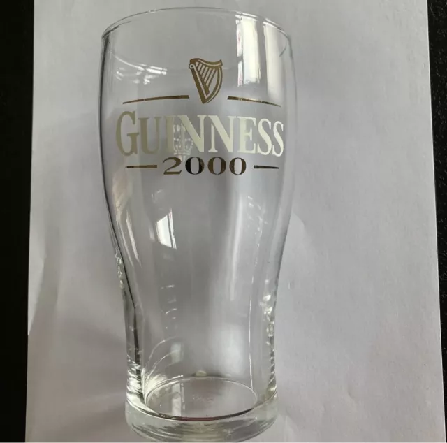 https://www.picclickimg.com/v-kAAOSw~mRkuNPc/Guinness-Pint-Glass-Millennium-2000-RARE-New-Old.webp