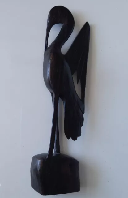 Wunderschöne Vogelfigur aus dunklem Holz, 19 cm