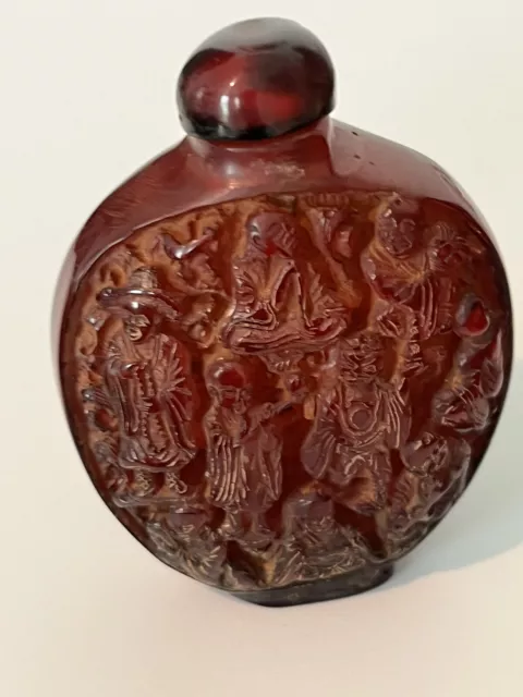 Chinese Amber? Snuff Bottle w/numerous figures 2.5"H x 1.875W x 0.75"D