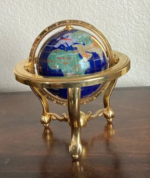 Small Rotating World Globe with Inlaid Gemstone