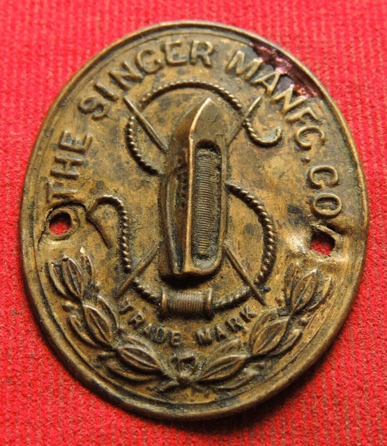 Old bronze emblem from a sewing machine 19th - early 20th century