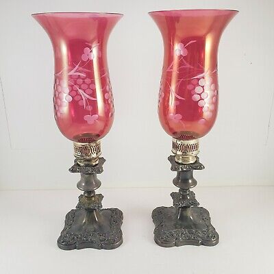 Pair of Etched Cranberry Hurricane Glass Candlesticks on Ornate Heavy Metal Base