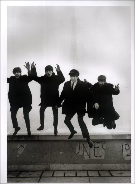 https://www.picclickimg.com/v6EAAOSwrrleMIJX/The-Beatles-Poster-Page-1964-Eiffel-Tower.webp