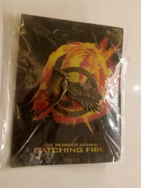 2013 Neca Hunger Games Mockingjay New Lapel Movie Logo Replica Pin Catching Fire