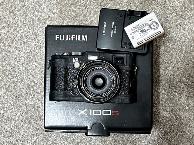 Fujifilm X100s + Lens Hood + Battery (x2) + Charger + Box