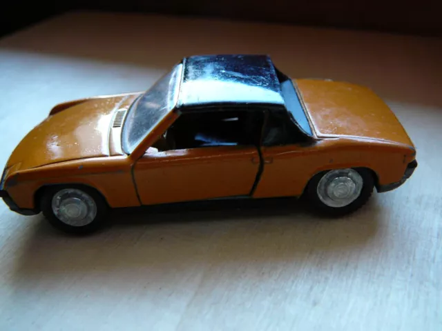 SCHUCO Modellauto VW Porsche No. 826 827 orange schwarz Türen öffenbar