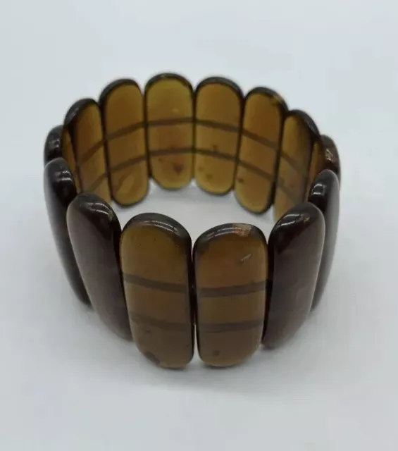 Gros bracelet en ambre de la Baltique  39 Gr.largeur :3,8cm .Diamètre :6cm TBE