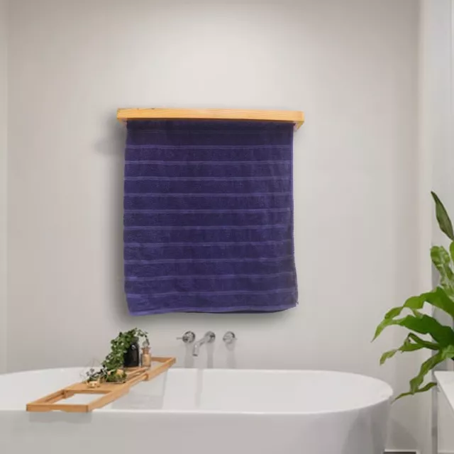 Un toallero de madera para baño es un tipo de toallero que está fabricado...