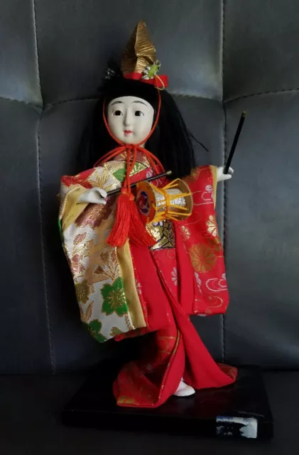 Vintage Porcelain Japanese Geisha Doll Holding Tsuzumi Drum - figurine