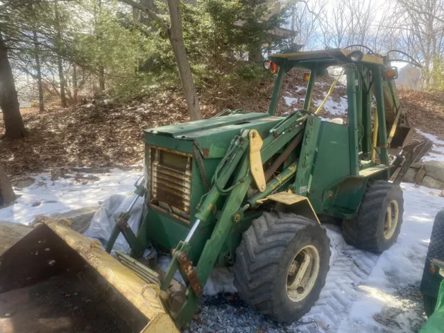 New Holland Articulating Backhoe-Needs Engine!