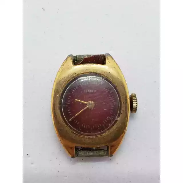 Men's Timex watch. Red background for face. Gold bevel. Sold as is