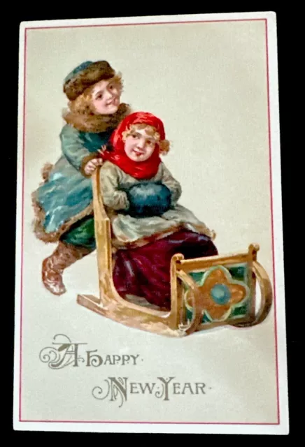 Vintage GERMAN POSTCARD CHILDREN Sled Toboggan A Happy New Year Christmas Season