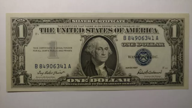 FR1619-1957 Silver Certificate Uncirculated Bright Blue Seal. Very Sharp Color.