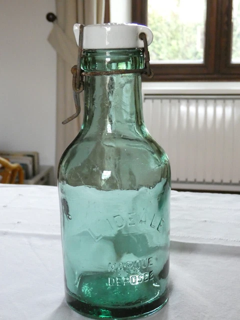 ANCIENNE BOUTEILLE CONSERVE EN VERRE PUBLICITAIRE L IDEALE PORCELAINE