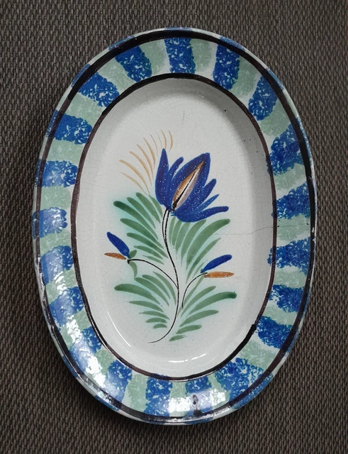 Plat en faïence dit cul noir début XIXème décor floral - ANTIQU'ART