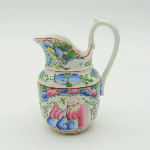 Bayeux. Gosse. Pot à lait en porcelaine décor personnages et fleurs, XIXe