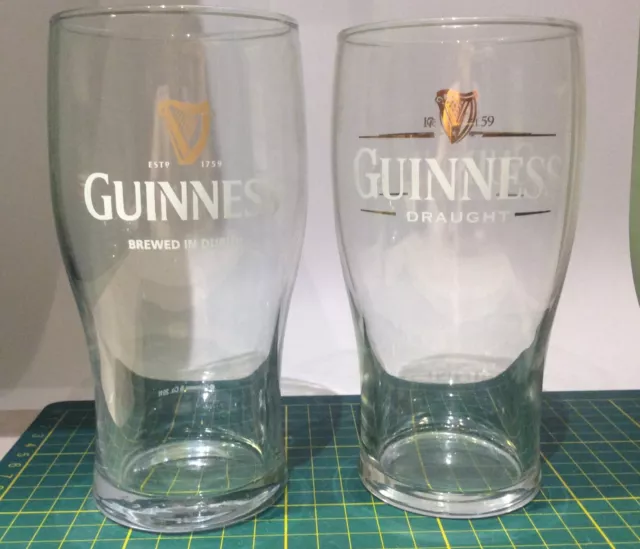 https://www.picclickimg.com/vI0AAOSwMIdlemE~/2x-Guinness-Embossed-Branded-Beer-20oz-Gravity-Pint.webp