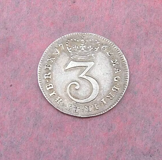 George III - 1762 Silver (.925) Three Pence .  Good VF. KM# 591
