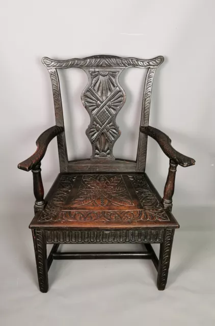 Antique Georgian carved oak elbow chair, Gothic style