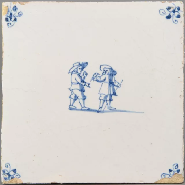 Nice Dutch Delft Blue tile, child play: children with bird, late 17th ct