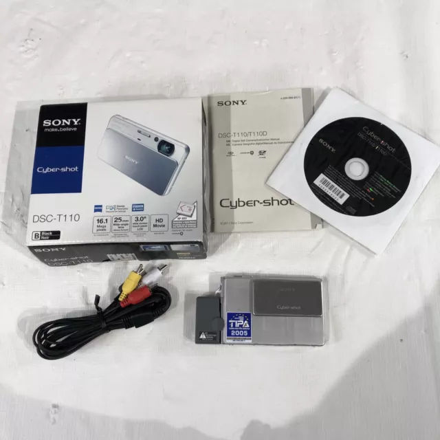Sony Cyber-shot DSC T110 16.1MP Digital Camera 4X Zoom Silver Slide Cover Movie