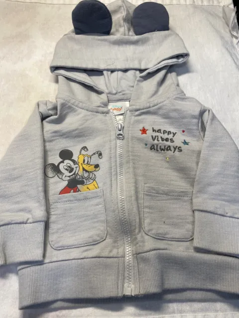 Disney Baby 6 Mths. Grey full zip hoodie w- ears. Mickey & Goofy on Front Pocket