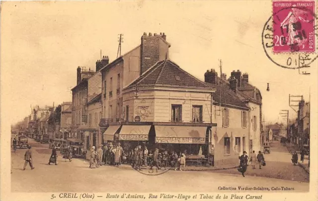 CPA 60 CREIL ROAD D'AMIENS RUE VICTOR HUGO ET TABAC DE LA PLACE CARNOT (cpa not
