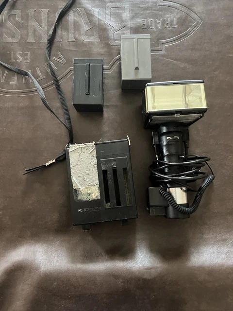 Metz 60 CT-2 Mecablitz Handle Mount Flash. with two batteries, no charger