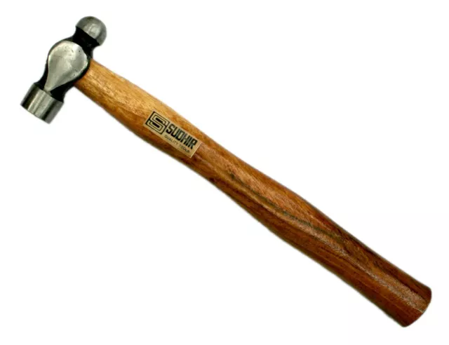 Ball Peen Hammer with metal head and wooden handle.