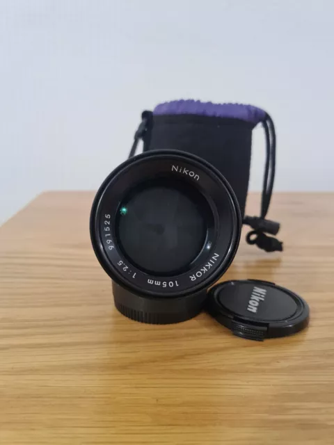 Nikon Nikkor 105mm f2.5 AI Super Sharp Lens Near Mint .caps And Case