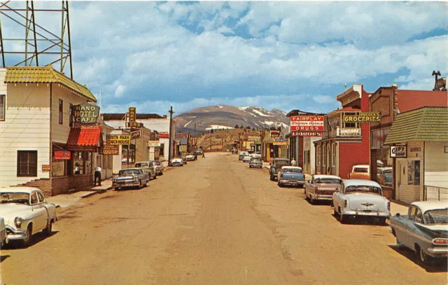 G81/ Fairplay Colorado Postcard Chrome Front Street Stores Hotel Autos