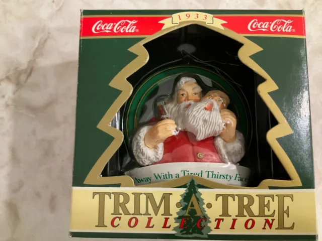 Coca Cola Trim A Tree Collection "Santa Mask Happy Holidays” 1933 Santa Ornament
