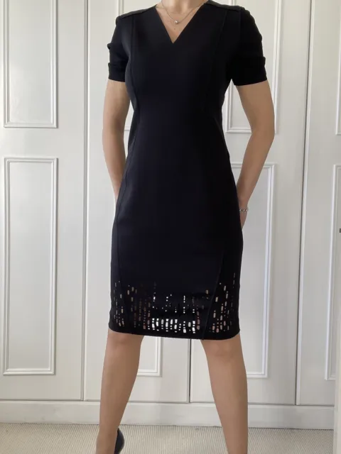 Elie Tahari Black dress With Subtle Cut Outs To the Bottom size 10