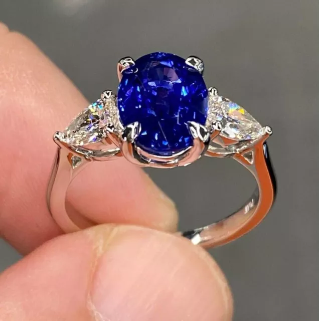 Bague en or blanc 14 carats bande saphir bleu coupe ovale 0,80 carat taille...