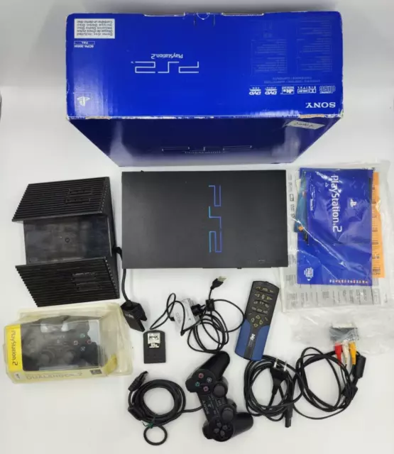 PS2 Console en  boîte + 2 manettes + 60 Jeux + Pad arcade + accessoires