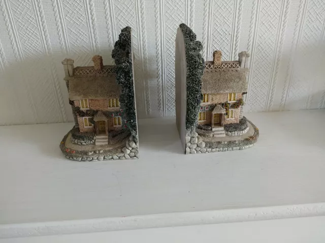 Pair Of Cottage Bookends Has  A Little Wear & Tear Please See Our Photos.