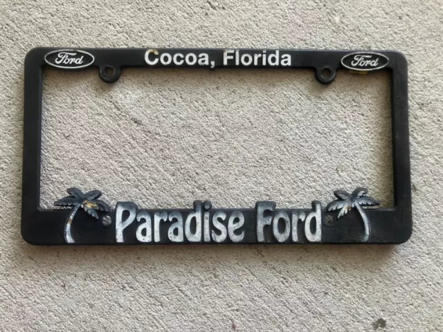 BLACK PLASTIC DEALERSHIP LICENSE PLATE FRAME: Paradise Ford, Cocoa Florida