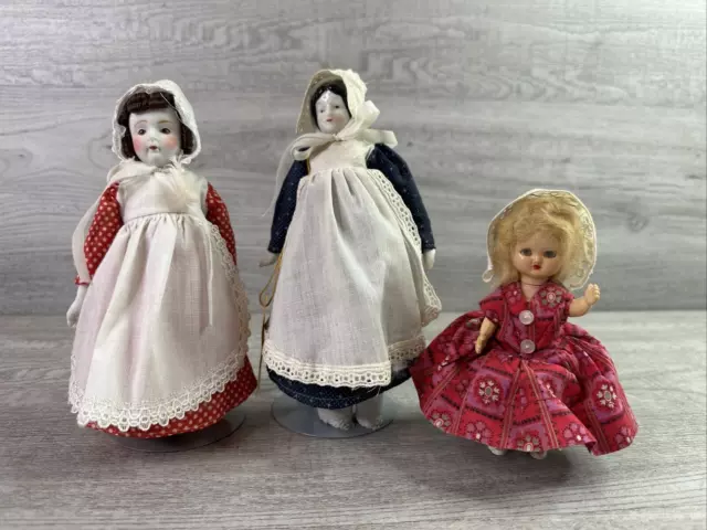 VTG Set of Dolls 2 w/Porcelain Face Hands Feet Victorian & 1 Small Blinking Doll