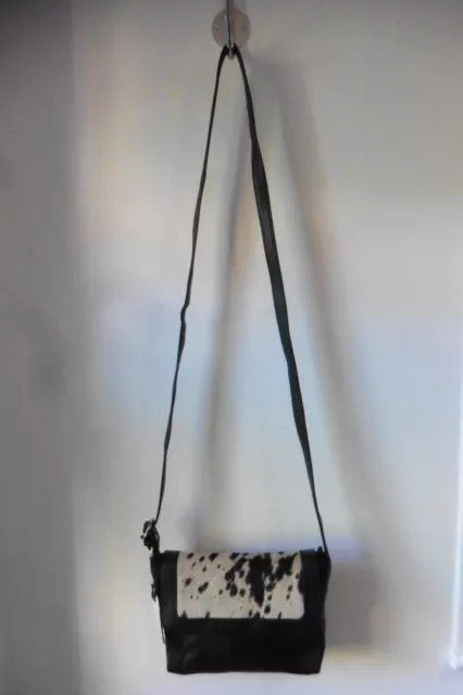 Taurus leather store crossbody bag