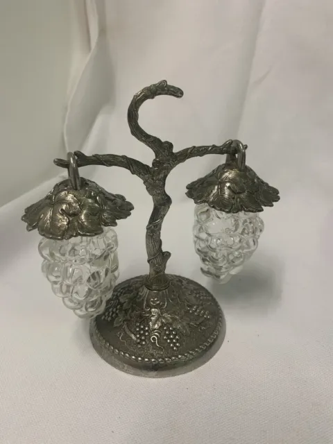 Salt and pepper shakers antique  vine theme silver and glass
