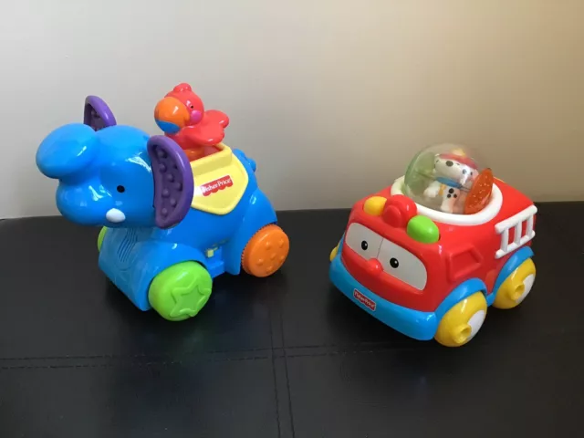 Fisher Price Elefant Tiergeräusche und ein Roll Around Push Along Feuerwehr