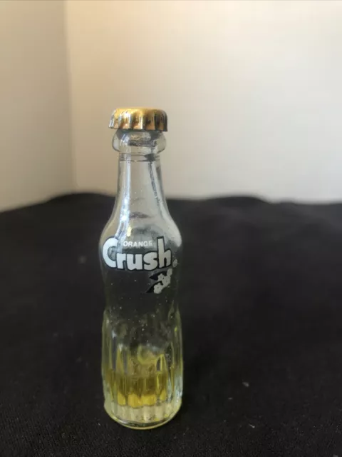 Vintage Miniature 3" Glass Orange Crush Bottle With Some Liquid Sealed