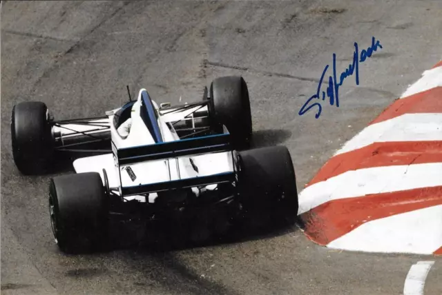 Rubens Barrichello (8) Helio Castroneves (3) and JR Hildebrand (4) race  into turn 1 during the IndyCar Series Sao Paulo 300 auto race, Sunday,  April 29, 2012, in Sao Paulo, Brazil. (AP