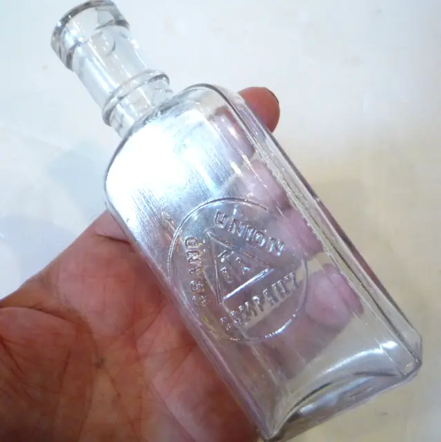 Antique Flavorings Bottle embossed "GRAND UNION TEA COMPANY"  Tooled Cork Top 5"