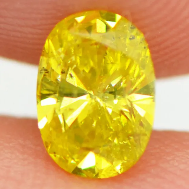 Oval Cut Diamond Fancy Yellow Loose SI2 Natural Enhanced 7.20X5.16 MM 0.91 Carat