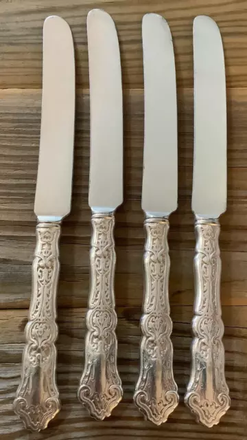 1835 R WALLACE - (1907) CARDINAL - SET of 4 HOLLOW DINNER KNIVES -  heavy wear